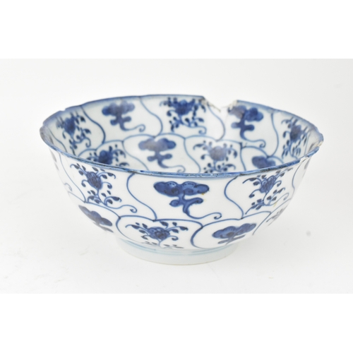 38 - A group of four Chinese and Japanese blue and white porcelain items, comprising: a dragon bowl paint... 