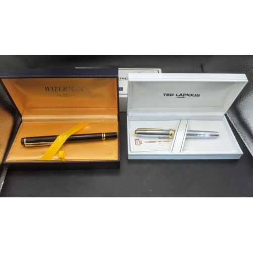 11 - Boxed pens to include a black cased Waterman ideal fountain pen with an 18ct gold nib along with a s... 
