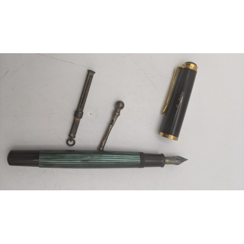 15 - Writing equipment to include a vintage Pelikan fountain pen, along with two vintage propelling penci... 