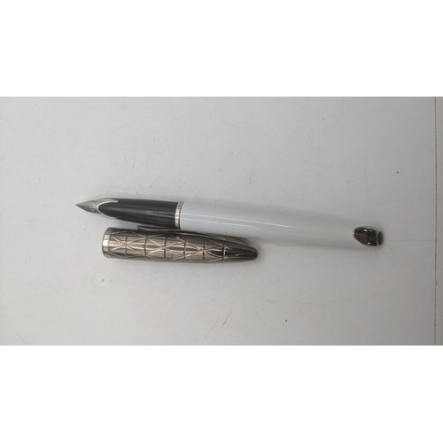 17 - An unboxed Waterman Carene Deluxe white fountain pen with an 18k white gold nib Location:C5
If there... 