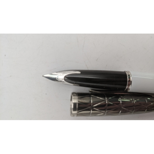 17 - An unboxed Waterman Carene Deluxe white fountain pen with an 18k white gold nib Location:C5
If there... 