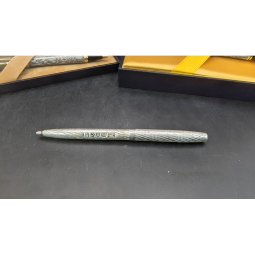 2 - A boxed waterman Rhapsody ballpoint pen with snakeskin lacquered design along with a boxed Waterman ... 