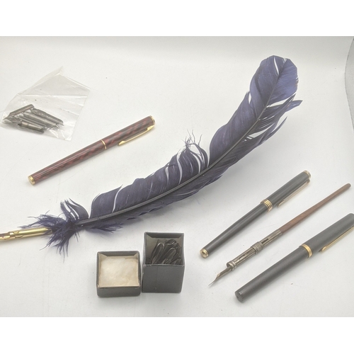 21 - Writing equipment to include a Sheaffer Targa fountain pen, a reproduction quill pen and other items... 