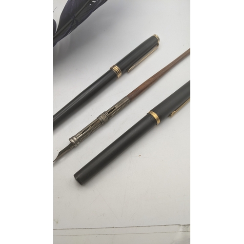 21 - Writing equipment to include a Sheaffer Targa fountain pen, a reproduction quill pen and other items... 