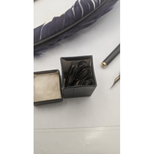 21 - Writing equipment to include a Sheaffer Targa fountain pen, a reproduction quill pen and other items... 