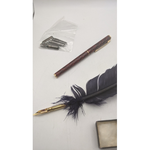 21 - Writing equipment to include a Sheaffer Targa fountain pen, a reproduction quill pen and other items... 