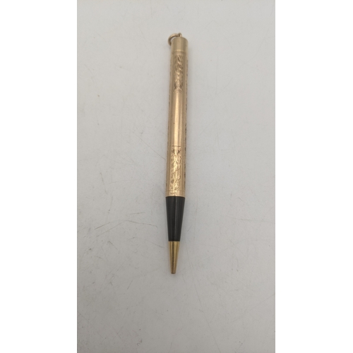 22 - A vintage Watermans 14kt gold cased propelling pencil with an engine turned design Location:C1
If th... 