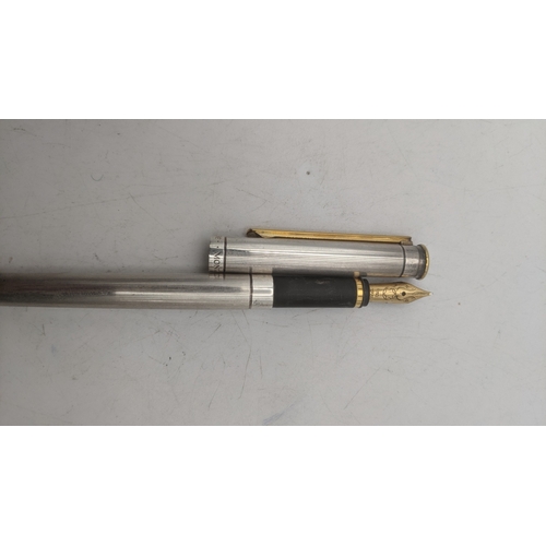 23 - A Montblanc Noblesse fountain pen and ballpoint pen set with stainless steel cases, the ballpoint pe... 