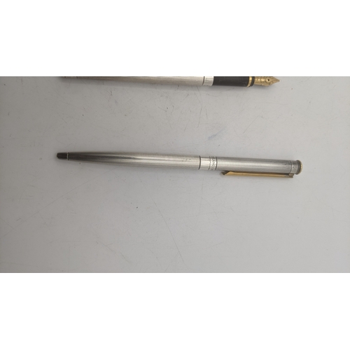 23 - A Montblanc Noblesse fountain pen and ballpoint pen set with stainless steel cases, the ballpoint pe... 