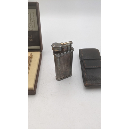 27 - Two cigarette lighters to include a silver plated vintage Dunhill Unique in a branded leather case a... 