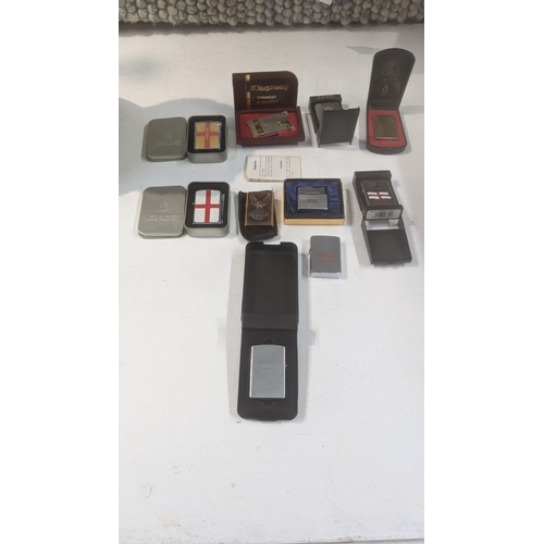 31 - A group of 10 cigarette lighters to include a boxed Piezo electric gold plated example, a boxed King... 