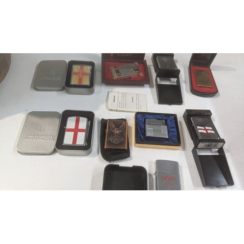 31 - A group of 10 cigarette lighters to include a boxed Piezo electric gold plated example, a boxed King... 