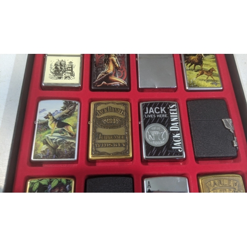 33 - A collection of 20 themed Zippo and Zippo style lighters to include two Jack Daniel's examples, four... 