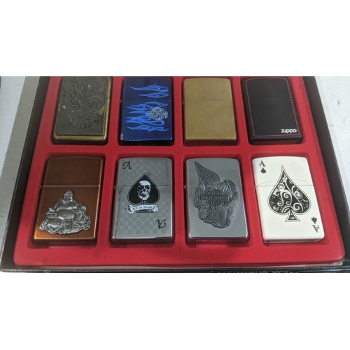33 - A collection of 20 themed Zippo and Zippo style lighters to include two Jack Daniel's examples, four... 