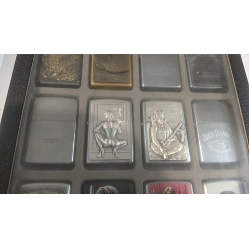 34 - A collection of 20 themed Zippo and Zippo style lighters to include a Budweiser example, a Marshall ... 