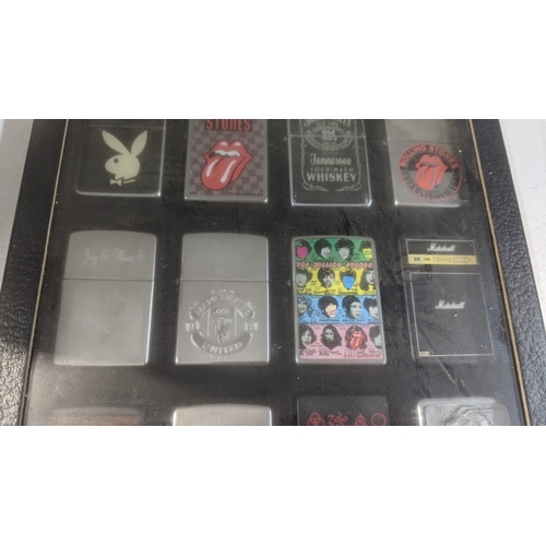 35 - A collection of 20 themed Zippo and Zippo style lighters to include a Rollin Stones Some Girls examp... 