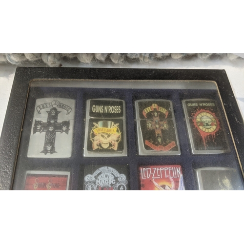 36 - A collection of 20 Zippo style lighters to include various Guns n Roses examples, a Star Wars exampl... 