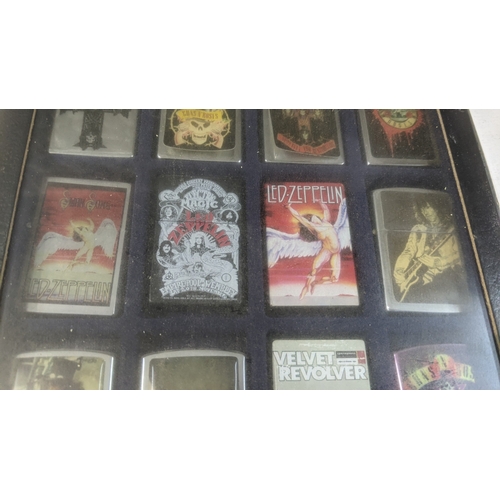 36 - A collection of 20 Zippo style lighters to include various Guns n Roses examples, a Star Wars exampl... 