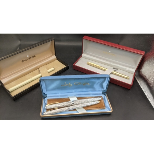 4 - A boxed Sheaffer writing equipment to include a Lady  Sheaffer silver plated fountain pen and ballpo... 
