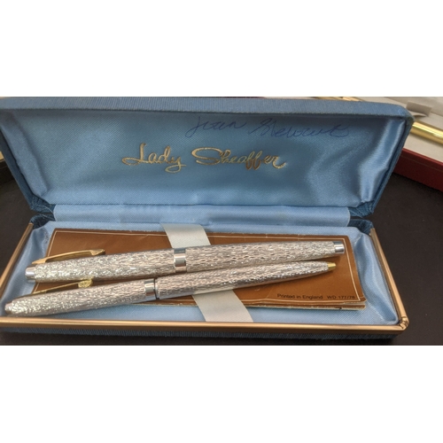 4 - A boxed Sheaffer writing equipment to include a Lady  Sheaffer silver plated fountain pen and ballpo... 