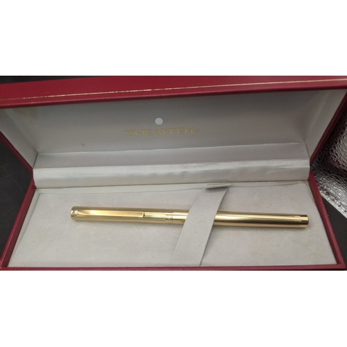 4 - A boxed Sheaffer writing equipment to include a Lady  Sheaffer silver plated fountain pen and ballpo... 