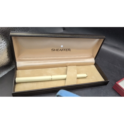 4 - A boxed Sheaffer writing equipment to include a Lady  Sheaffer silver plated fountain pen and ballpo... 