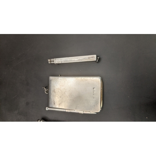 7 - Silver cased desk items to include a miniature notepad, an S Morgan & Co continental propelling penc... 