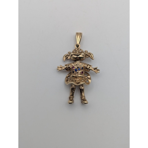 1 - A 9ct yellow gold Angelica Pickles rugrats doll pendant set with coloured stones having articulated ... 