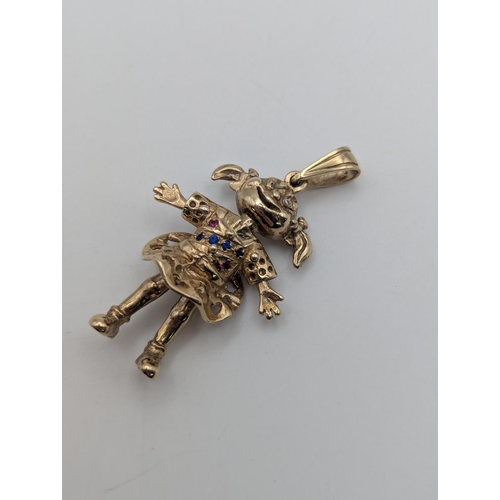 1 - A 9ct yellow gold Angelica Pickles rugrats doll pendant set with coloured stones having articulated ... 