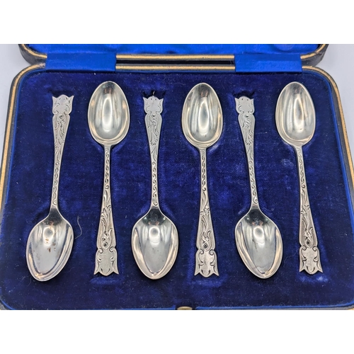 12 - A set of six Edwardian silver teaspoons by John Round and Son with engraved decoration to the termin... 
