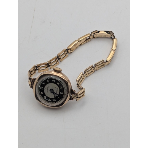 16 - A 9ct gold ladies Lenroc wristwatch on a rolled gold bracelet, total weight 12.5g Location:C1
If the... 