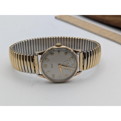 18 - A 1960s 9ct yellow gold cased gents Vertex wristwatch on a gold tone steel expanding bracelet, along... 