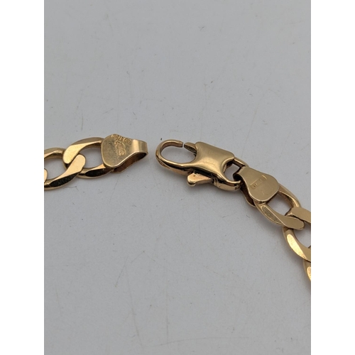 20 - A 9ct yellow gold curb link bracelet with lobster claw clasp stamped 375, 22cm long, 8.9g Location:C... 