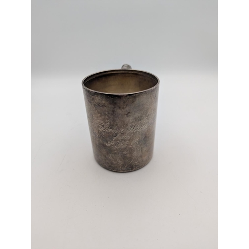 37 - A sterling silver lidded pot by Tiffany and Co having an ornate handle and engraved initials and dat... 
