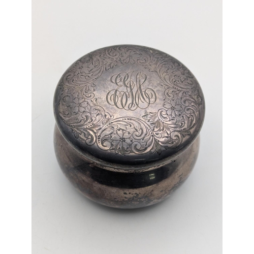 38 - A sterling silver lidded pot by Black Starr and Frost with floral scroll engraved decoration to the ... 