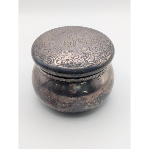 38 - A sterling silver lidded pot by Black Starr and Frost with floral scroll engraved decoration to the ... 