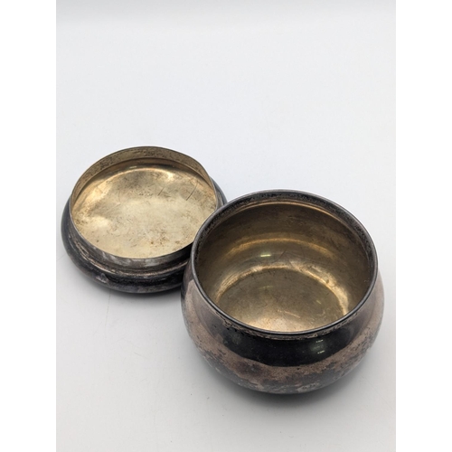 38 - A sterling silver lidded pot by Black Starr and Frost with floral scroll engraved decoration to the ... 