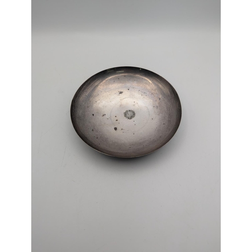39 - A sterling silver dish in circular form and flared rim, 13cm diameter, weight 102.7g
Location:P7
If ... 