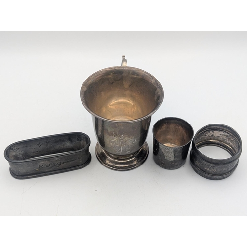 43 - Mixed silver items to include a French brandy tester, a Christening cup with engraved inscription to... 