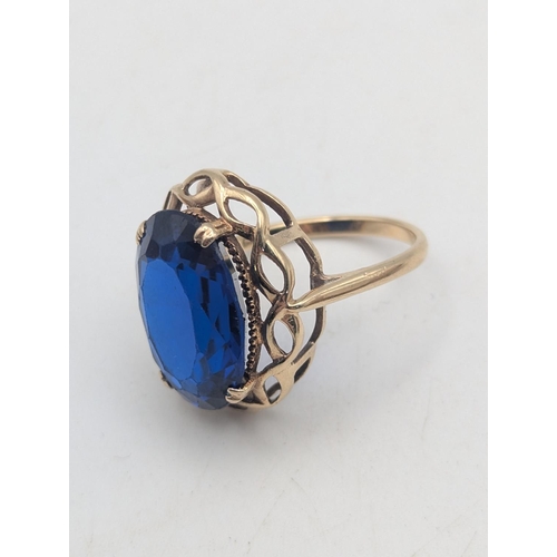 44 - A 9ct gold ring set with a large blue paste stone, early 20th century cameo brooch set with gilt whi... 