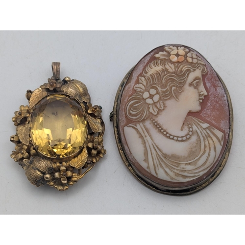 44 - A 9ct gold ring set with a large blue paste stone, early 20th century cameo brooch set with gilt whi... 