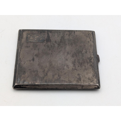 49 - A George VI silver cigarette case having engine turned decoration with gilt interior hallmarked Birm... 