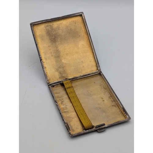 49 - A George VI silver cigarette case having engine turned decoration with gilt interior hallmarked Birm... 