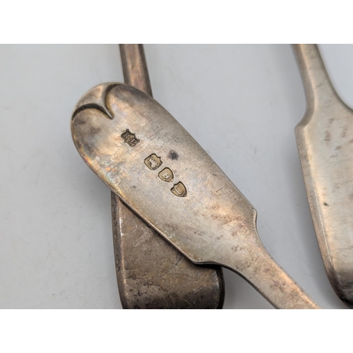 60 - A set of six Victorian silver fiddle pattern table spoons hallmarked London 1895 by Robert Pringle a... 