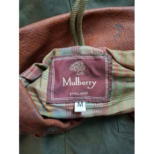 3 - Mulberry- A gents green wax cotton drovers coat having a brown leather collar and elbow pads and tar... 