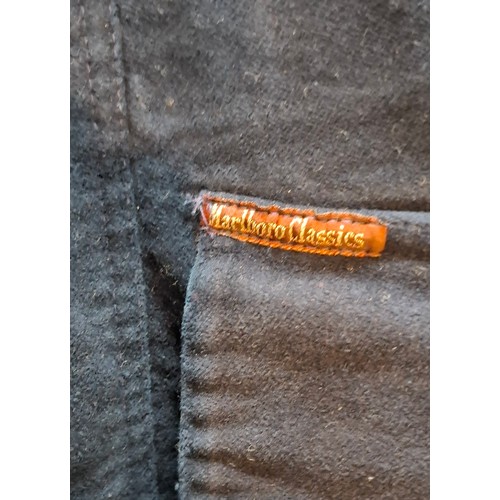 31 - Marlboro Classics- A gents navy full length country/outdoor/riding coat having a grey collar, size X... 