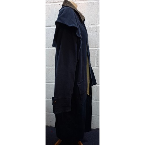 31 - Marlboro Classics- A gents navy full length country/outdoor/riding coat having a grey collar, size X... 