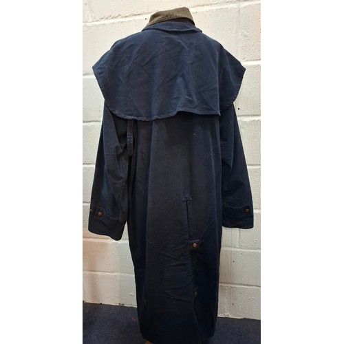 31 - Marlboro Classics- A gents navy full length country/outdoor/riding coat having a grey collar, size X... 