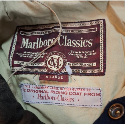31 - Marlboro Classics- A gents navy full length country/outdoor/riding coat having a grey collar, size X... 