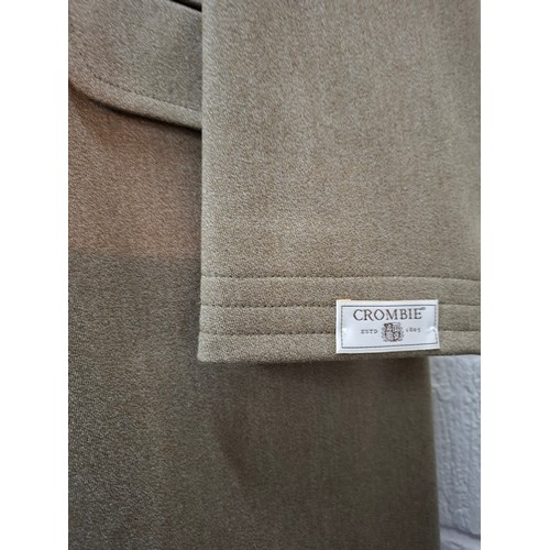 32 - Crombie- An unworn gents pure new wool coat having a brown velvet collar size 42R with original tags... 